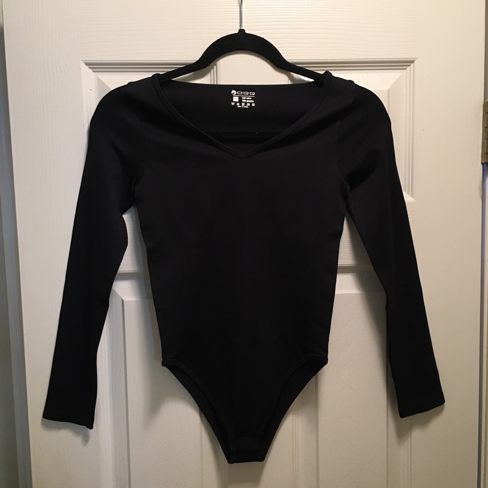 NWOT OQQ Stretch Long Sleeves Bodysuit
